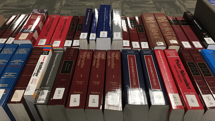 Photo of law books for sale through the King County Law Library.